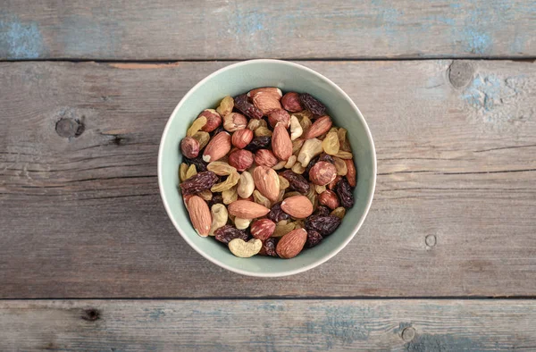 Mezclar Las Nueces Tazón Sobre Fondo Madera Vista Superior — Foto de Stock