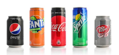 Kyiv, Ukraine - September 5, 2018:  Group of most popular brands of soda drinks in aluminum cans isolated on white. Brands included in this group are Coca Cola, Pepsi, Sprite, Fanta, Dr. Pepper clipart