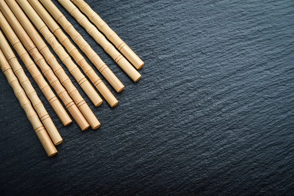 Bamboo Chopsticks Copy Space Black Slate Background Top View — Stock Photo, Image