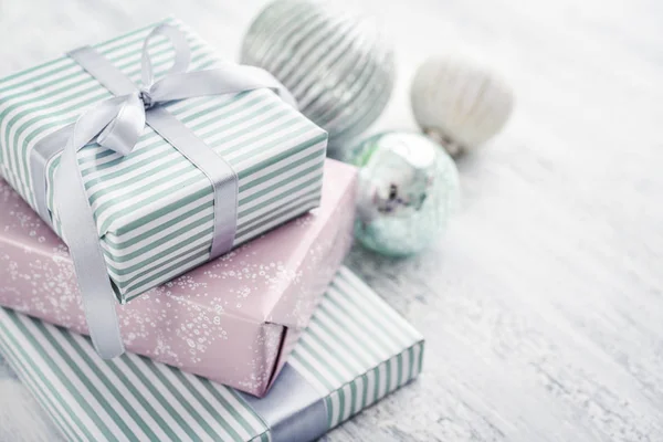 Stack Gift Boxes Christmas Decoration White Wooden Background Closeu — Stock Photo, Image