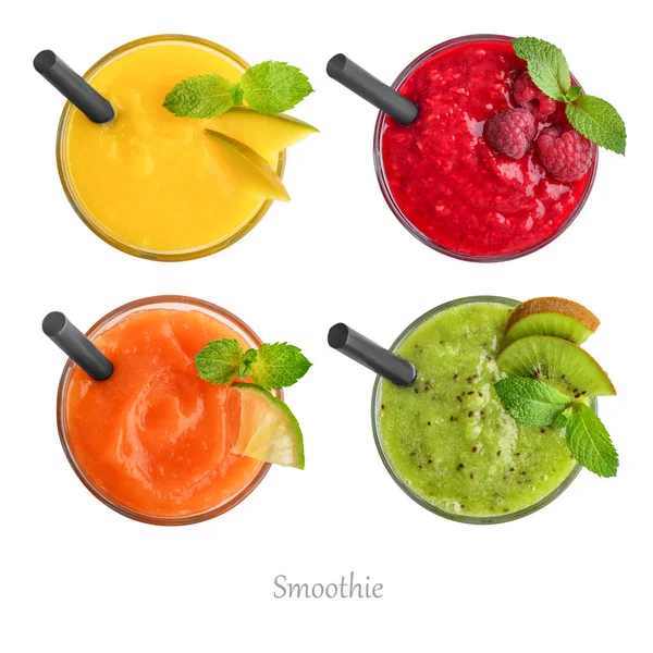 Glasses of mango, raspberry, papaya and kiwi smoothie — Stock Photo, Image