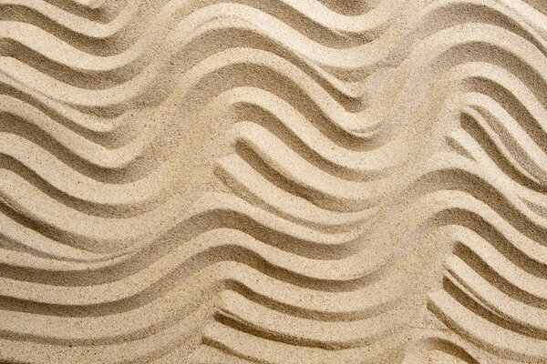 Texture line wave sand on the beach, nature background, top view