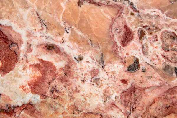 Rode marmeren steen textuur close-up — Stockfoto