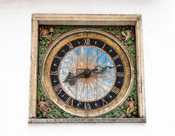 Old wooden clock in Tallinn, Estonia — Stock Photo, Image