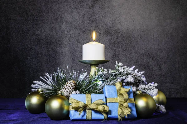 Blue Christmas Gifts Gold Ribbon Ornaments Blue Green Garland Burning — Stock Photo, Image