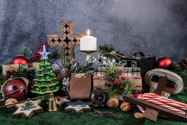 Still Life Vintage Christmas Presents Decorations Green Burning Candle Cross — Stock Photo, Image