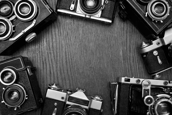 Een Oude Camera Een Houten Achtergrond Van Bovenaf — Stockfoto