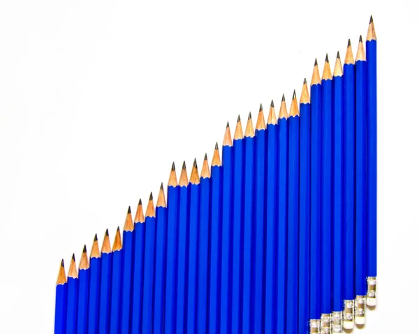 Pencils are simple in blue on a white background with a view from the top — Stock Photo, Image