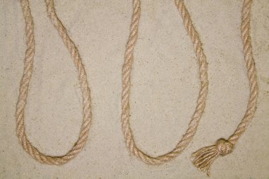 metin için yer ile arka plan üst görünümü olarak kum üzerinde ip