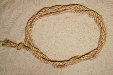 metin için yer ile arka plan üst görünümü olarak kum üzerinde ip