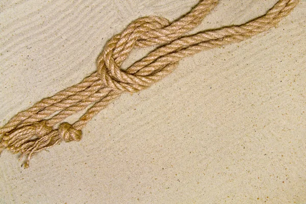 Corde sur sable comme vue de dessus de fond avec place pour le texte — Photo