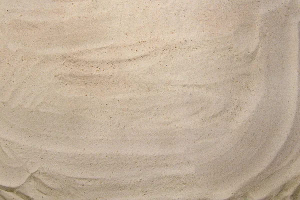 Zbliżenie piasku piękna gładka tekstura na plaży w letnim słońcu. — Zdjęcie stockowe