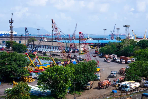 Mumbai, August 2019, India: Downtown view of mumbai port area. Busy crane and truck working in Dock area of Mumbai.