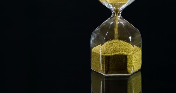 Hourglass Old Style Black Background Golden Sand Poured Upper Flask — Stock Video