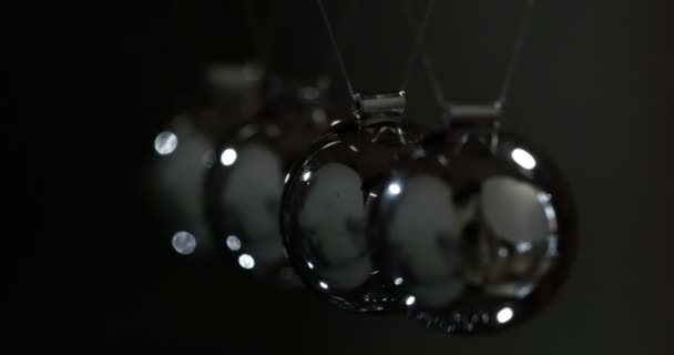 Action Reaction Loop Steel Shiny Balls Suspended Dark Background Interact — Stock Video