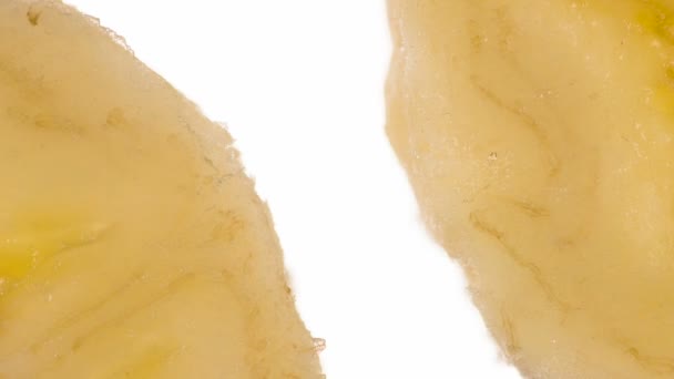 Zwei Bananenscheiben Komprimieren Das Fruchtfleisch Der Banane Wird Komprimiert Und — Stockvideo