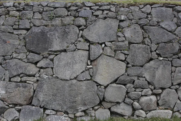 关闭了一个古老的城墙的印加文明在马丘比丘 Pichuu 库斯科 雕刻为完美装配的石头 — 图库照片