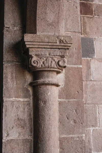 Colonial Catholic church wall architecture detail in Cuzco Peru. Carved in stone by hand.