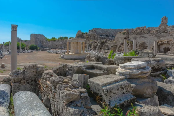 The ruins of the ancient Roman city of Side in Turkey. The remains of buildings, theater and other infrastructure of the ancient city. Historical monuments of ancient Greek and Roman eras.