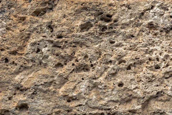 Strukturierte Unebene Steinoberfläche Gelber Kalkstein Hintergrundbild Baumaterial — Stockfoto