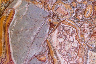 Mermer doku kökenli. Çok renkli kapanımlar farklı taş. Kapanımlar çeşitli formları. Retro tarzı dekorasyonda iç panelleri.