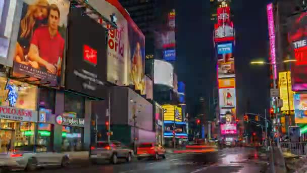 ニューヨーク- 2018年1月11日:タイムズスクエアの夜と昼のタイムズスクエア — ストック動画