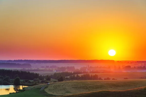 Red sunset in a countryside — Stock Photo, Image