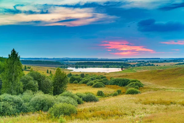 Sunset over lake — Stock Photo, Image