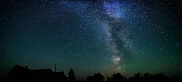 Panoramic view of night sky and milky way — Stock Photo, Image