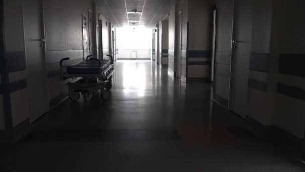 Dark Long Hallway Medical Gurney — Stock Video