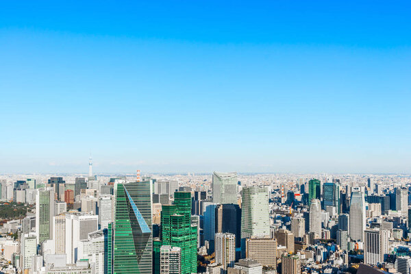Asia Business concept for real estate and corporate construction - panoramic modern city skyline bird eye aerial view under blue sky in Roppongi Hill, Tokyo, Japan