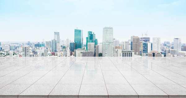 Business concept - Empty marble floor top with panoramic modern cityscape building bird eye aerial view under sunrise and morning blue bright sky of Tokyo, Japan for display or montage product