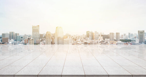 Business concept - Empty marble floor top with panoramic modern cityscape building bird eye aerial view under sunrise and morning blue bright sky of Tokyo, Japan for display or montage product