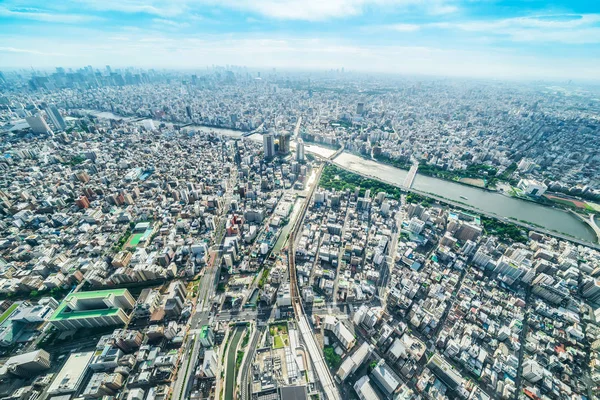不動産や企業建設 パノラマの近代的な都市都市スカイライン空中鳥瞰図東京都太陽 青い空の下でのアジア ビジネス コンセプト — ストック写真