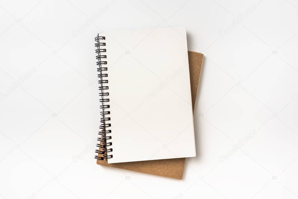 Business concept - Top view collection of two kraft spiral notebook isolated on background for mockup