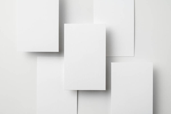 Empty business cards with copy space on white background 