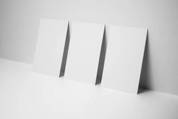 Blank business cards on white background for mockup.