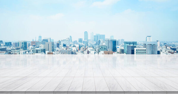 Business concept - Empty marble floor top with panoramic modern cityscape buildings of Tokyo, Japan.