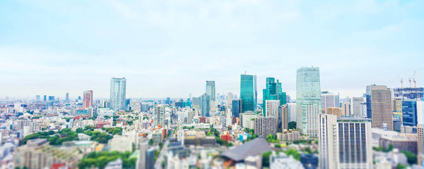 Business concept for real estate corporate construction - panoramic modern city skyline in Tokyo, Japan.