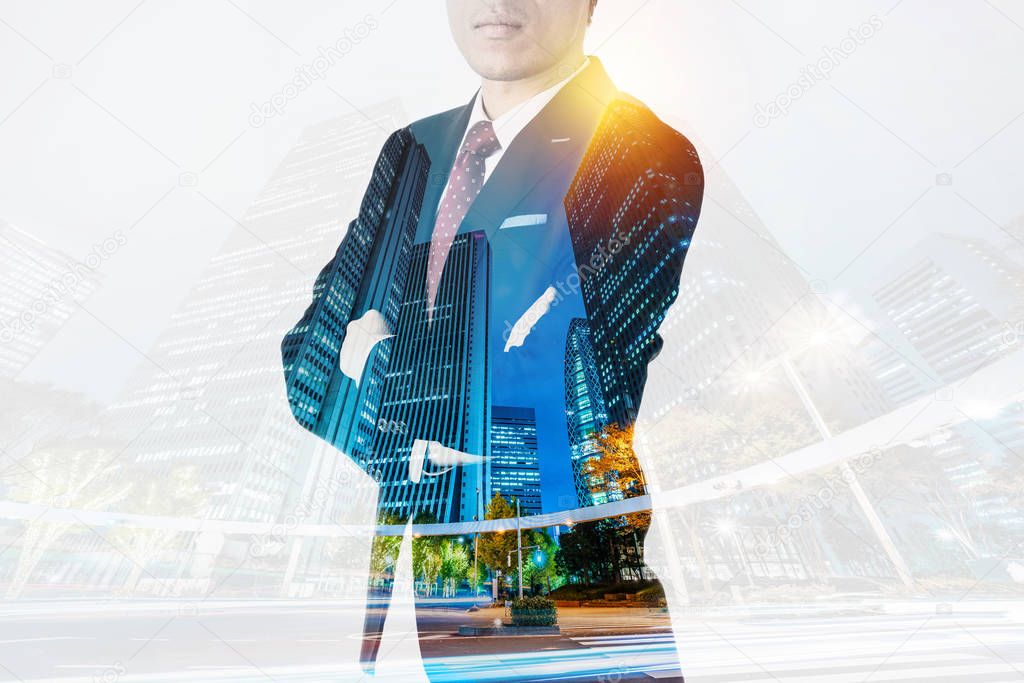 Asian business concept - thoughtful modern office man with dark suit with double exposure effect