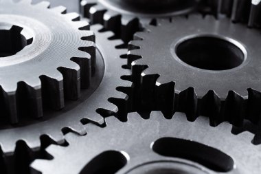 Ekip çalışması iş konsepti - endüstriyel arka plan için motor dişli tekerleklerin perspektif görünümü.