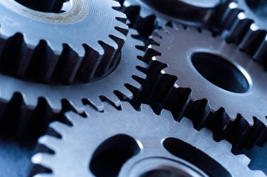 Ekip çalışması iş konsepti - endüstriyel arka plan için motor dişli tekerleklerin perspektif görünümü.