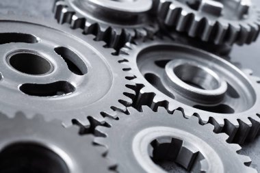 Ekip çalışması iş konsepti - endüstriyel arka plan için motor dişli tekerleklerin perspektif görünümü.