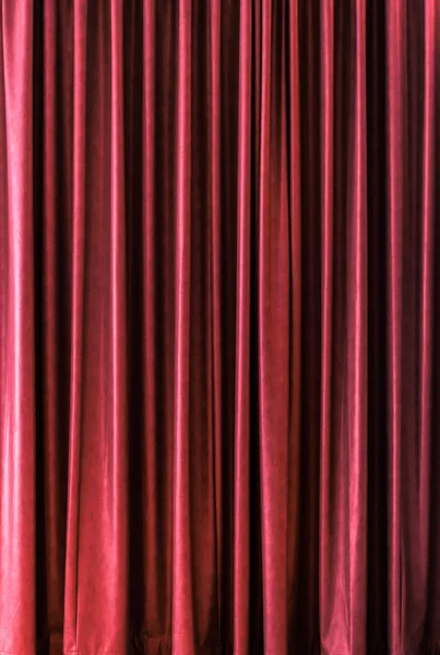 Design material - closed stage curtain with light effect in theater
