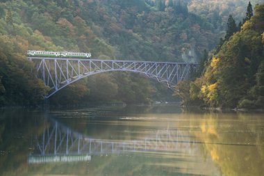 Autumn fall foliage Fukushima First Bridge View Point daiichi kyouryou in Mishima Fukushima, Japan clipart