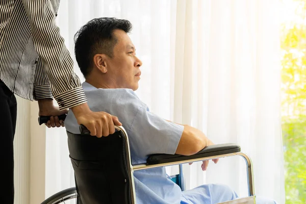 Elderly Patient His Relative Wheelchair Looking Window — Stock Photo, Image