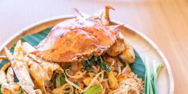 Pad Thai, stir fried noodle, with blue crab. Thai eastern traditional food cuisine