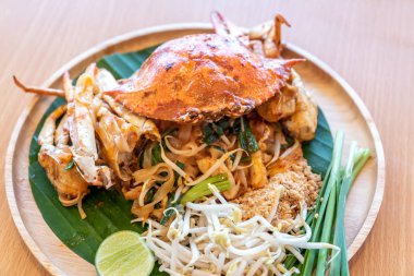 Pad Thai, stir fried noodle, with blue crab. Thai eastern traditional food cuisine
