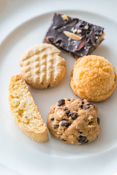 Variety Cookies Chocolate Bar White Dish — Stock Photo, Image