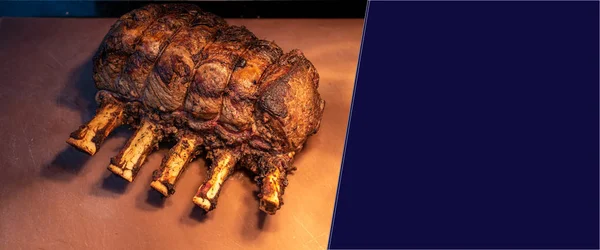 Wagyu beef roast prime rib, Carving food, panoramic crop for web banner